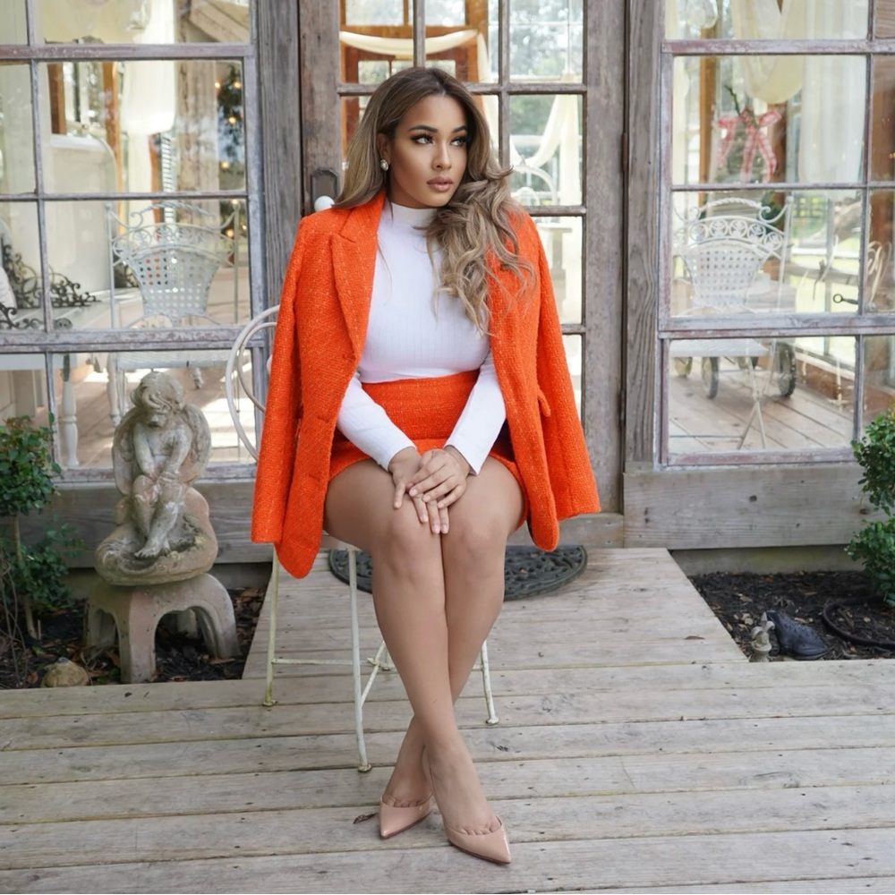 Orange two piece skirt suit